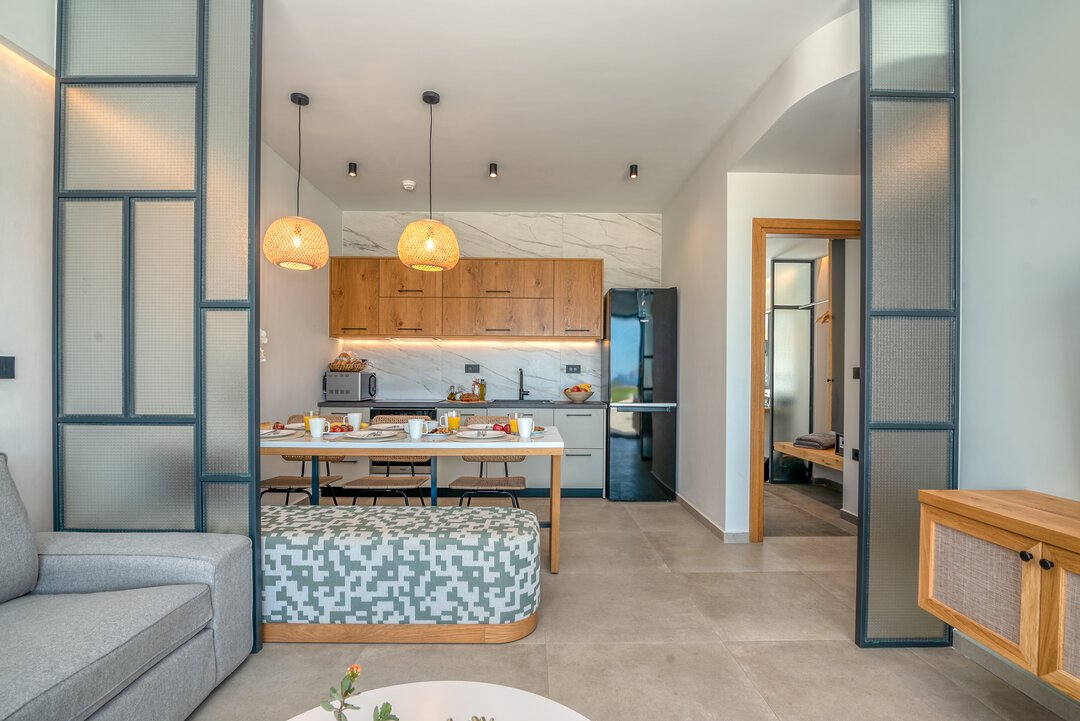 Bathroom detail showing fresh towels and quality amenities at Nusa Falassarna, Crete