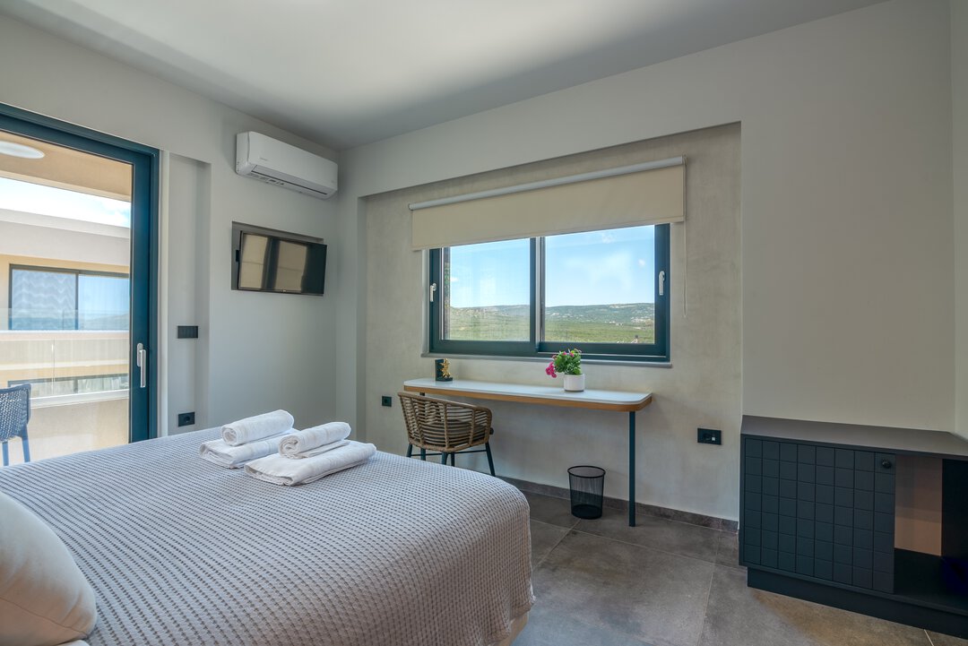 Fully equipped kitchen with stainless steel appliances and generous counter space at Nusa Falassarna villa, Crete