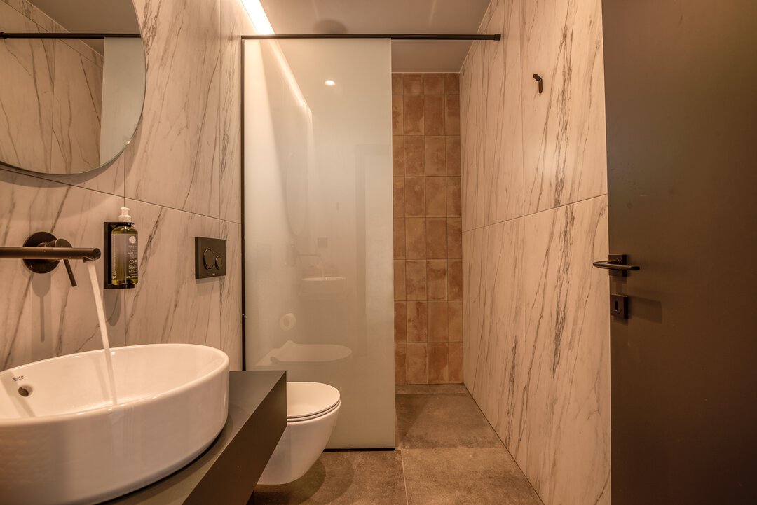 Interior design showcasing quality materials and contemporary style at Nusa Falassarna, Crete