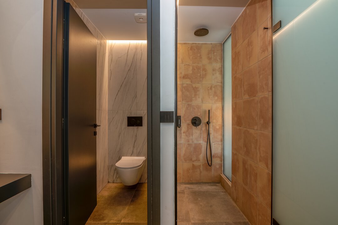 Functional dressing area with hanging rail and shelf at Nusa Balos, Crete