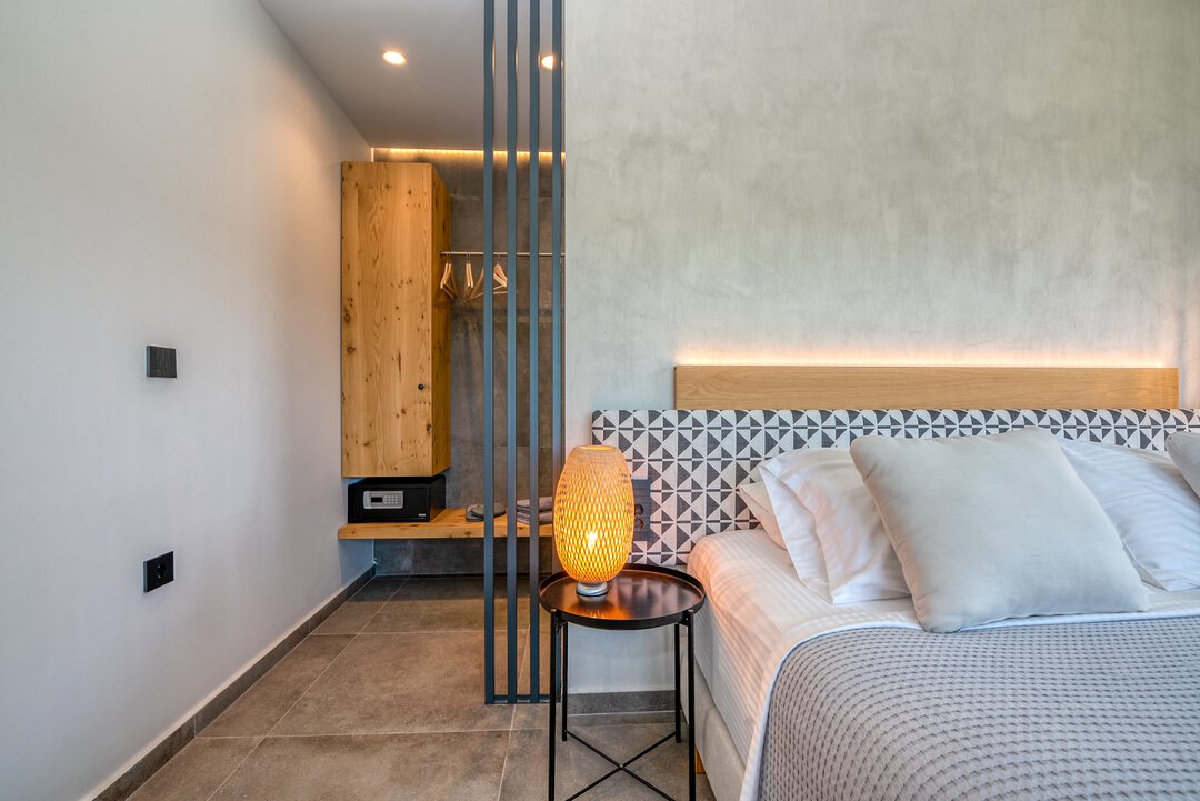 Serene bedroom with modern Mediterranean design at Nusa Balos villa, Crete