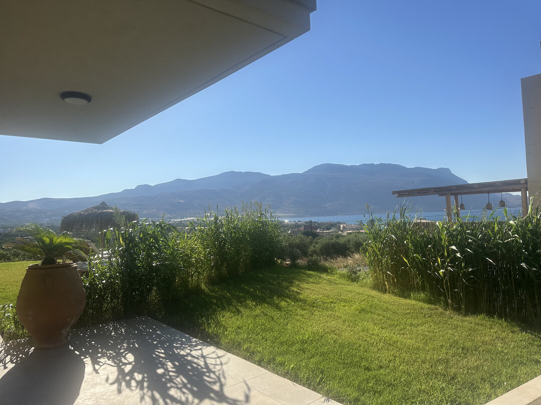 NUSA Balos outdoor terraces, pool, and pergola spaces
